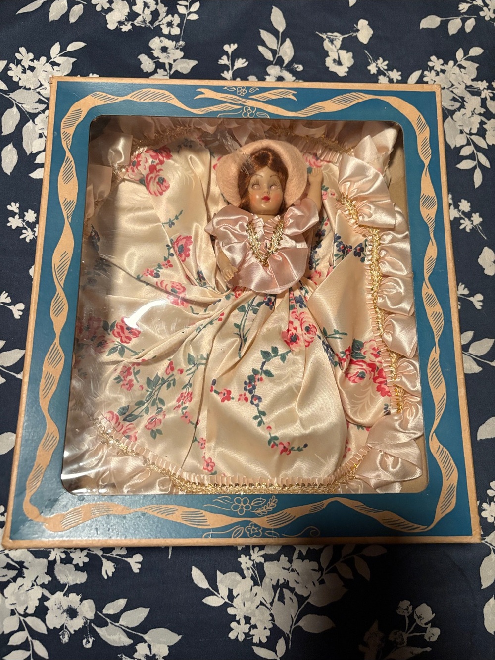Vintage Porcelain Doll in Floral Satin Dress